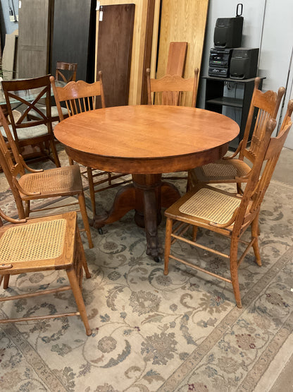 Antique Round Dining Table w/6 Canned Bottom Chairs & 2 Leafs