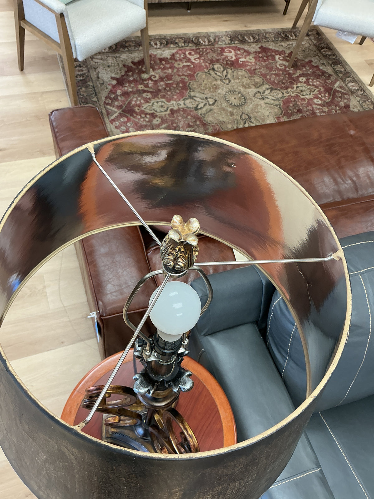 Bronze Scrollwork Base Paired With A Dark Crackled Shade
